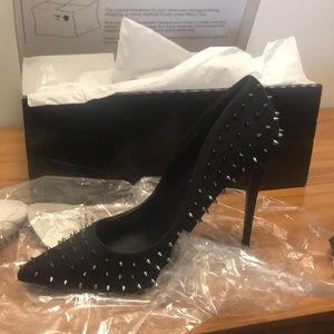 Spiked black heels